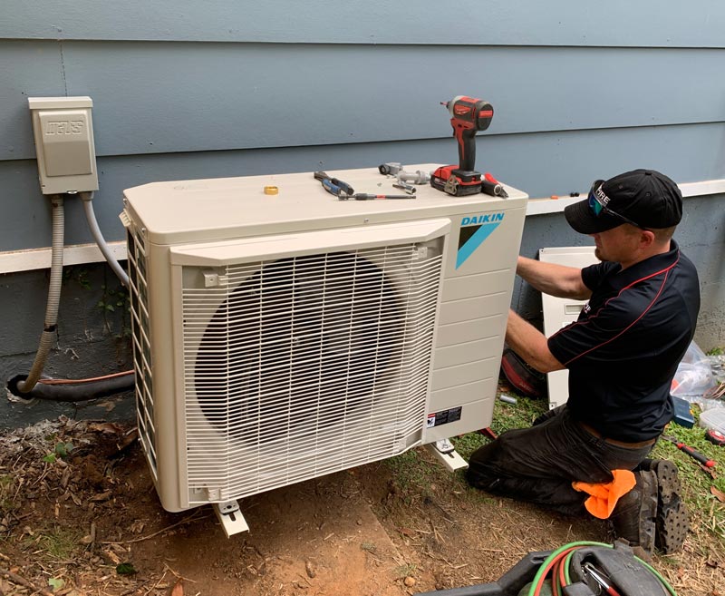 Professional HVAC technician at work